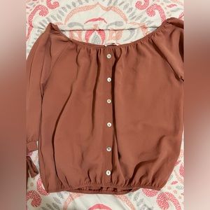 pinkish top with tie sleeve detail, size M